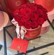 19 Червоних троянд в шляпній коробці «S» "Презент"